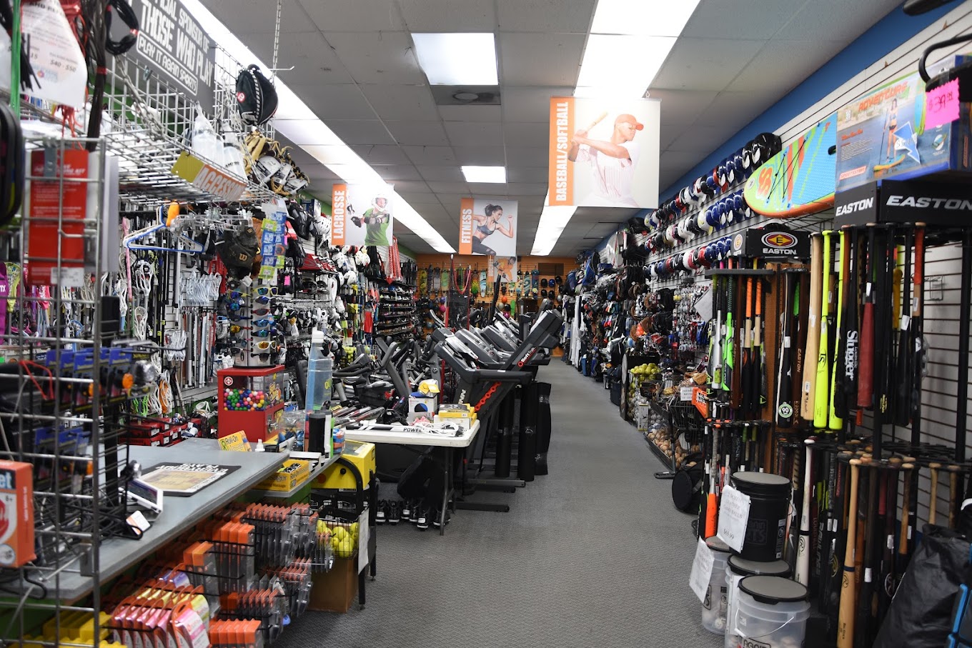 A picture of the interior of Play It Again Sports in Tampa filled with sporting goods of all variety.