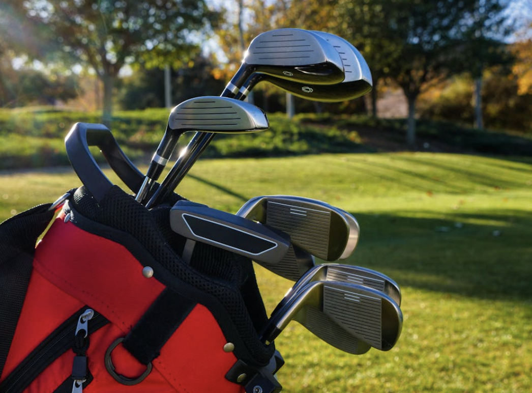 golf bag full of clubs